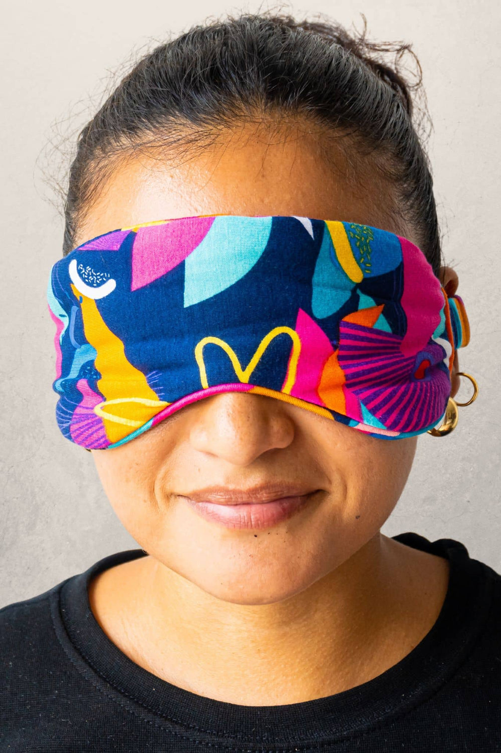 Model wearing cancun print soft bamboo eyemask for sleeping