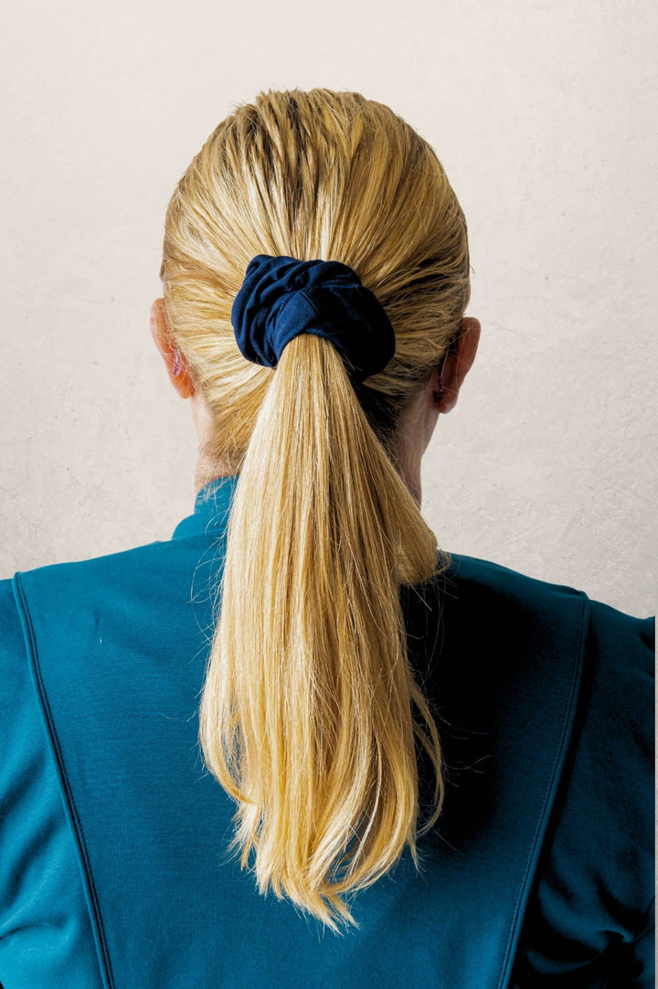 Navy seminyak scrunchie on blonde hair made for holidays perfect for sleeping soft bamboo